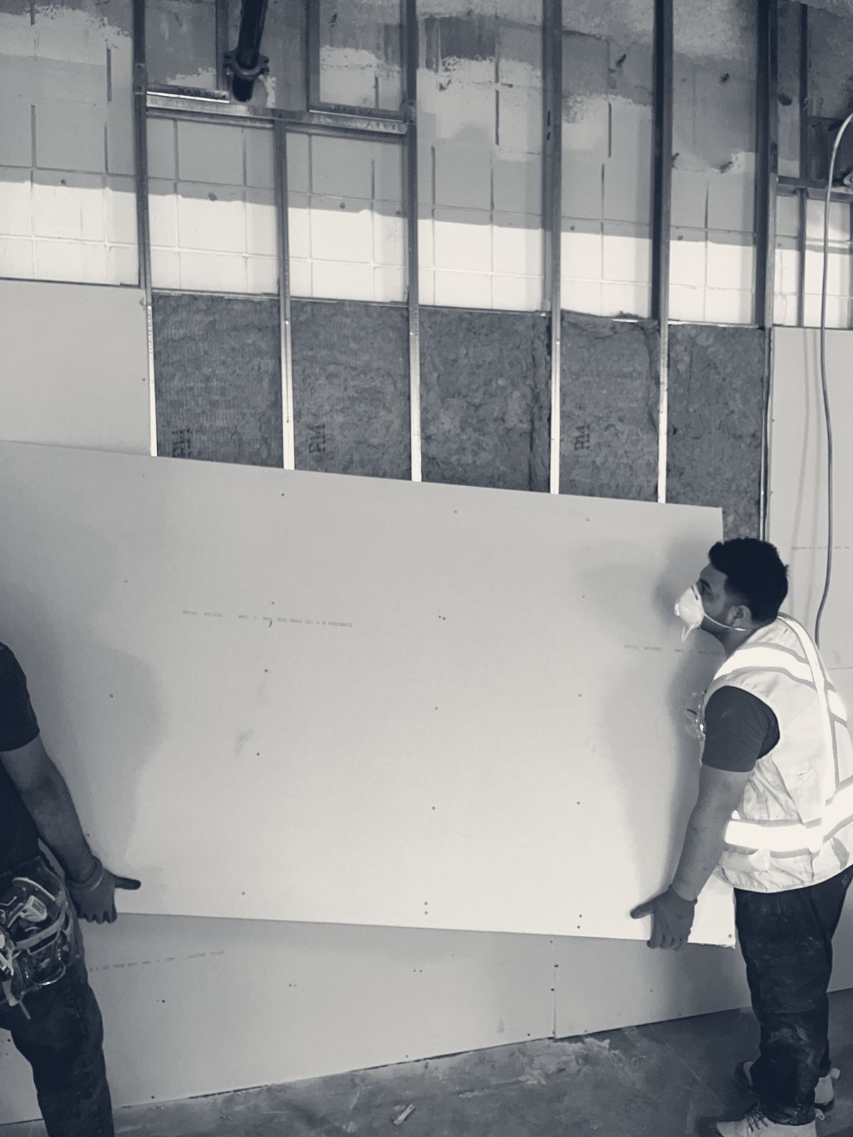 Boarding and drywall in progress